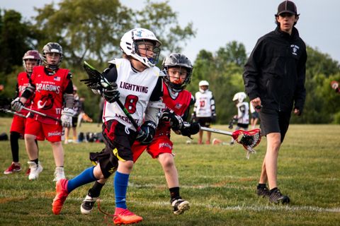 Lightning Lacrosse player celebrating with teammates (39)